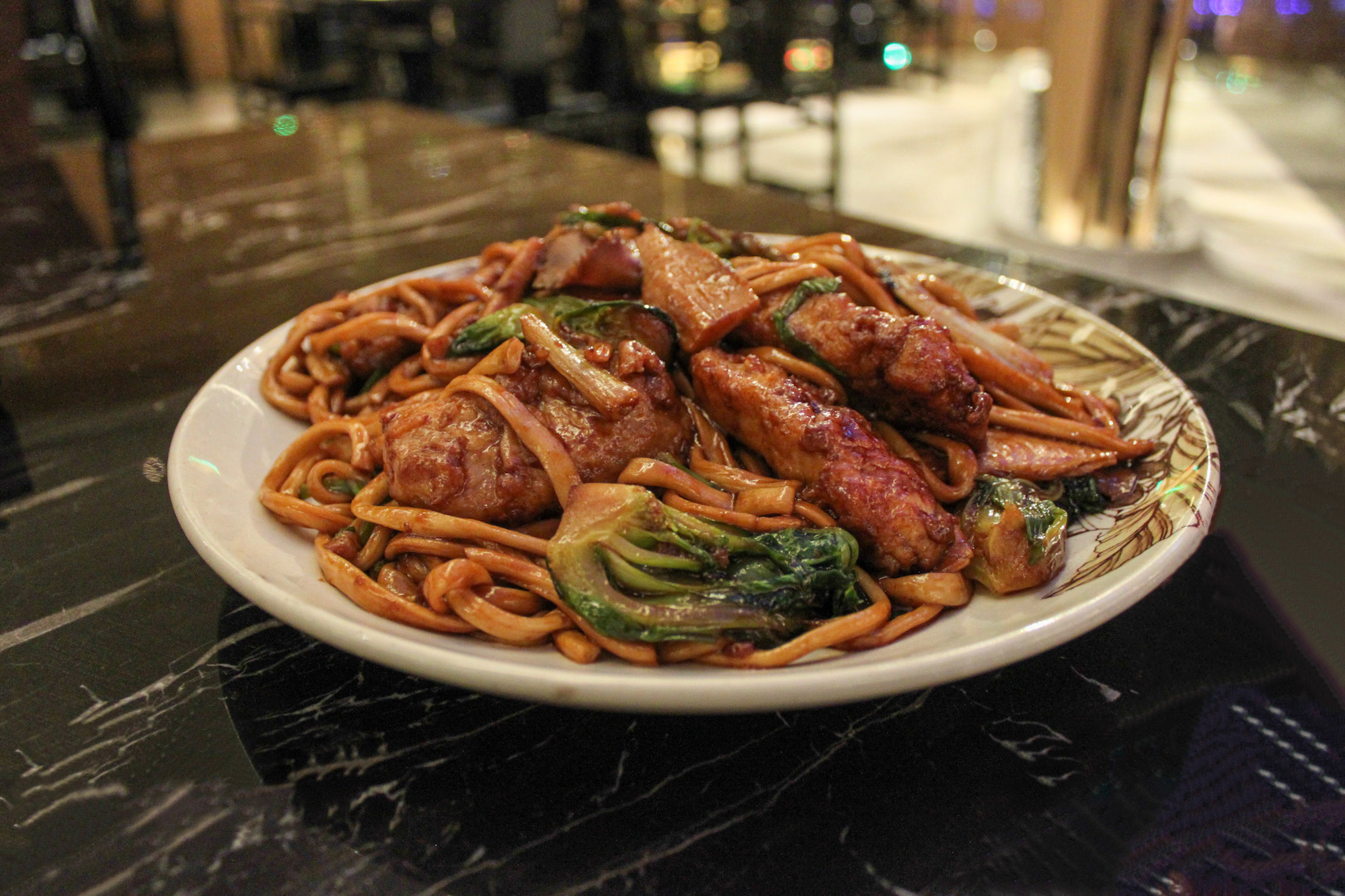 noodles congee stir-fry la mian with pork chop and black mushrooms